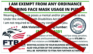 An example of an unofficial mask exemption card with a large red X through it.
